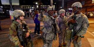 National Guard troops are pictured as they are deployed throughout the city during a protest against the police shooting of Keith Scott, in Charlotte, North Carolina, U.S. September 22, 2016. REUTERS/Jason Miczek