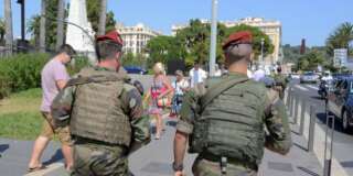 Armed French paratroopers patrol the street to maintain security after French lawmakers approved a six-month extension of emergency rule within France, in Nice  July 21, 2016. REUTERS/Jean-Pierre Amet