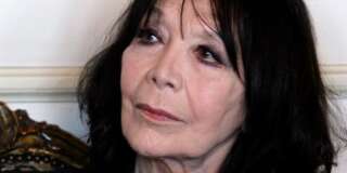 French actress and singer Juliette Greco attends a ceremony to receive the Vermeil Medal of Paris from Paris Mayor Bertrand Delanoe at City Hall in Paris, Thursday, April 12, 2012. (AP Photo/Francois Mori)