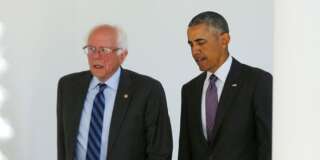 Democratic presidential candidate Bernie Sanders (L) walks with U.S. President Barack Obama to the Oval Office at the White House in Washington, U.S. June 9, 2016. REUTERS/Gary Cameron
