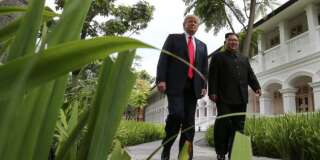 Donald Trump et Kim Jong Un lors du premier sommet historique,  le 12 juin 2018 à Singapour.