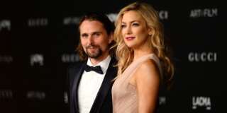 Matthew Bellamy, left, and Kate Hudson arrive at the LACMA Art + Film Gala at LACMA on Saturday, Nov. 1, 2014, in Los Angeles. (Photo by Jordan Strauss/Invision/AP)
