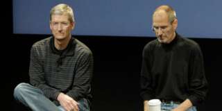 In this July 16, 2010 photo shows Apple's Tim Cook, left, and Steve Jobs, right, during a meeting at Apple in Cupertino, Calif. Cook takes over as CEO for Apple after Jobs resigned. (AP Photo/Paul Sakuma)