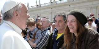 US artist Patti Smith, right, is greeted by Pope Francis at the end of his weekly general audience, in St. Peter's Square at the Vatican, Wednesday, April 10, 2013. (AP Photo/L'Osservatore Romano)