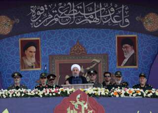Le président iranien Hassan Rohani s'exprime lors d'une cérémonie militaire à Téhéran samedi 22 septembre