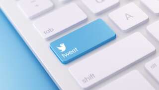 Image d'illustration d'un clavier avec le logo de Twitter.