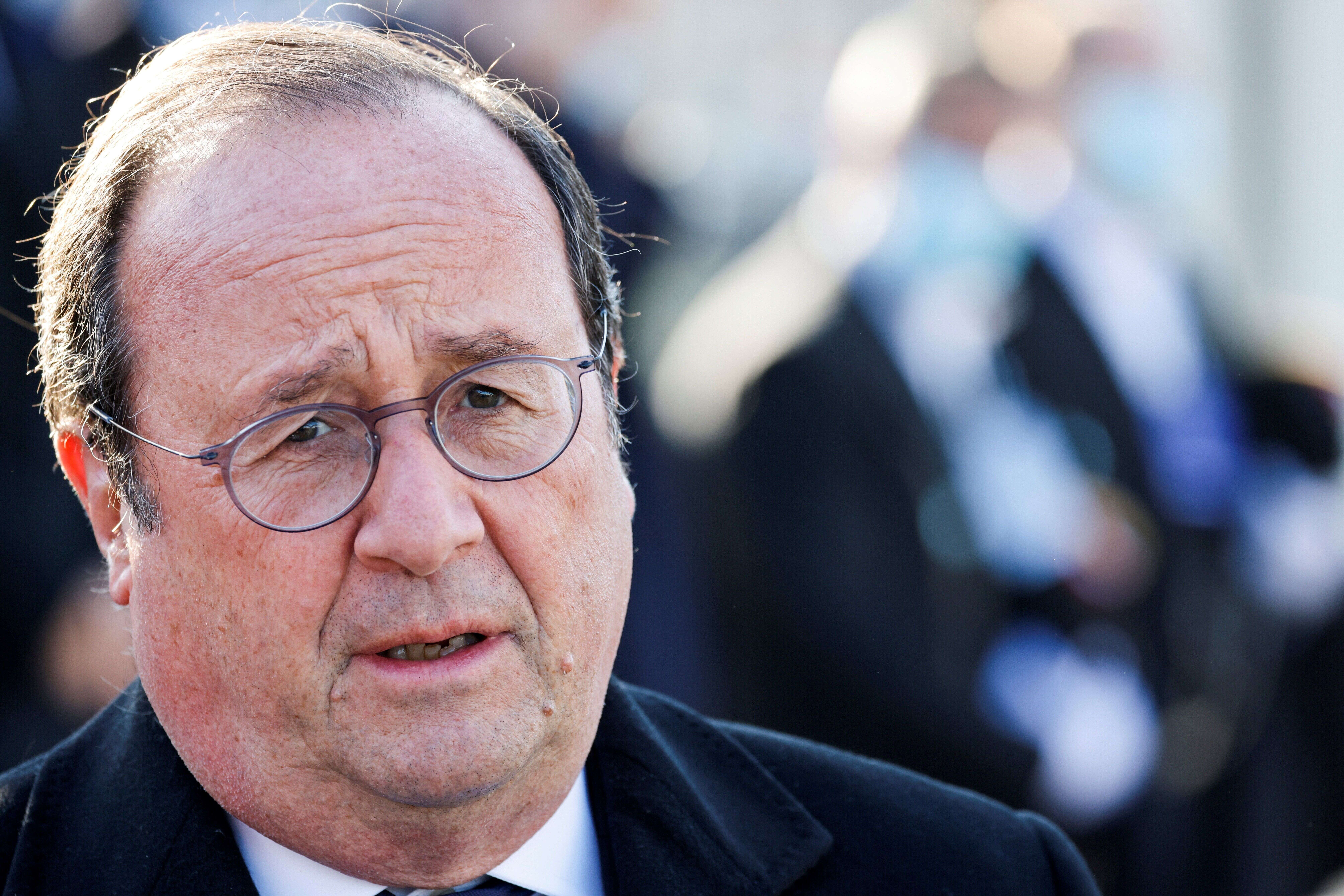Former French president Francois Hollande attends a ceremony as part of commemorations marking the 103rd anniversary of the November 11, 1918 Armistice, ending World War I, at the Arc de Triomphe, in Paris, France, November 11, 2021. Ludovic Marin/Pool via REUTERS