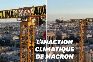 Sur une grue de Notre-Dame-de-Paris, Greenpeace déploie une banderole