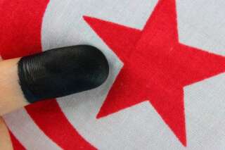 Elections en Tunisie: les islamistes d'Ennahda deuxièmes, Nidaa Tounes en tête selon les premières estimations