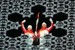 Aux JO de Pékin, une athlète ouïghoure porte la flamme olympique en dernier