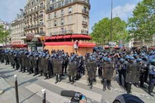 1er mai: La Rotonde protégée par un impressionnant cordon de CRS à Paris