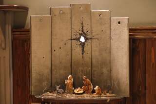 Banksy dévoile sa crèche de Noël emmurée à Bethléem