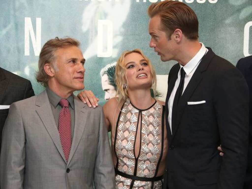 Britain The Legend Of Tarzan Premiere - Actors Christoph Waltz, Margot Robbie and Alexander Skarsgard pose for photographers upon arrival at the premiere of the film 'The Legend Of Tarzan' in London, Tuesday, July 5, 2016. (Photo by Joel Ryan/Invision/AP)