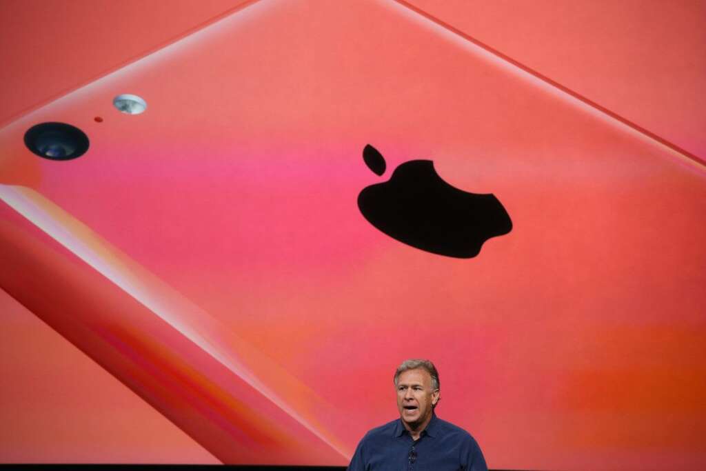 Keynote Apple - CUPERTINO, CA - SEPTEMBER 10:  Apple Senior Vice President of Worldwide Marketing at Phil Schiller speaks about the new iPhone 5C during an Apple product announcement at the Apple campus on September 10, 2013 in Cupertino, California. The company launched the new iPhone 5C model that will run iOS 7  is made from hard-coated polycarbonate and comes in various colors.  (Photo by Justin Sullivan/Getty Images)