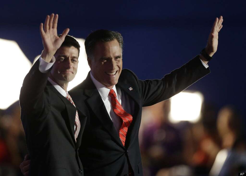 Republican vice presidential nominee, Rep. Paul Ryan, left and Republican presidential nominee Mitt Romney waves to delegates after his speech at the Republican National Convention in Tampa, Fla., on Thursday, Aug. 30, 2012. (AP Photo/Charlie Neibergall)