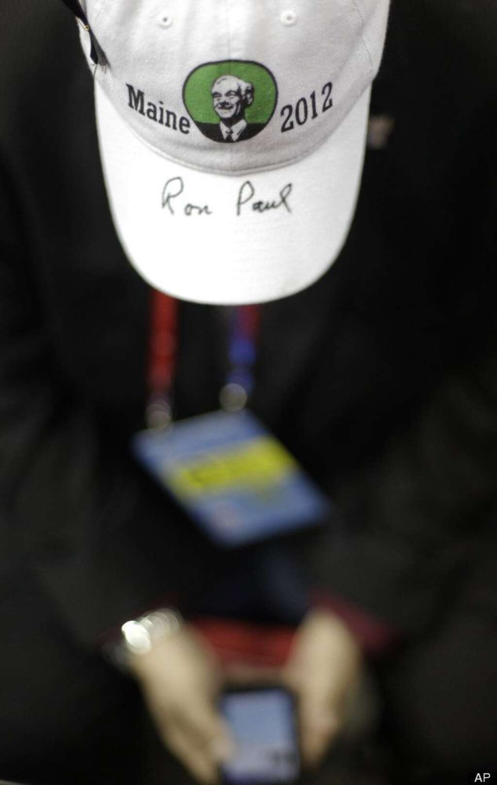 Bryan Daugherty - With Ron Paul's autograph on his hat, Maine delegate Bryan Daugherty from Bangor looks at his smart phone at the Republican National Convention in Tampa, Fla., on Tuesday, Aug. 28, 2012. (AP Photo/David Goldman)
