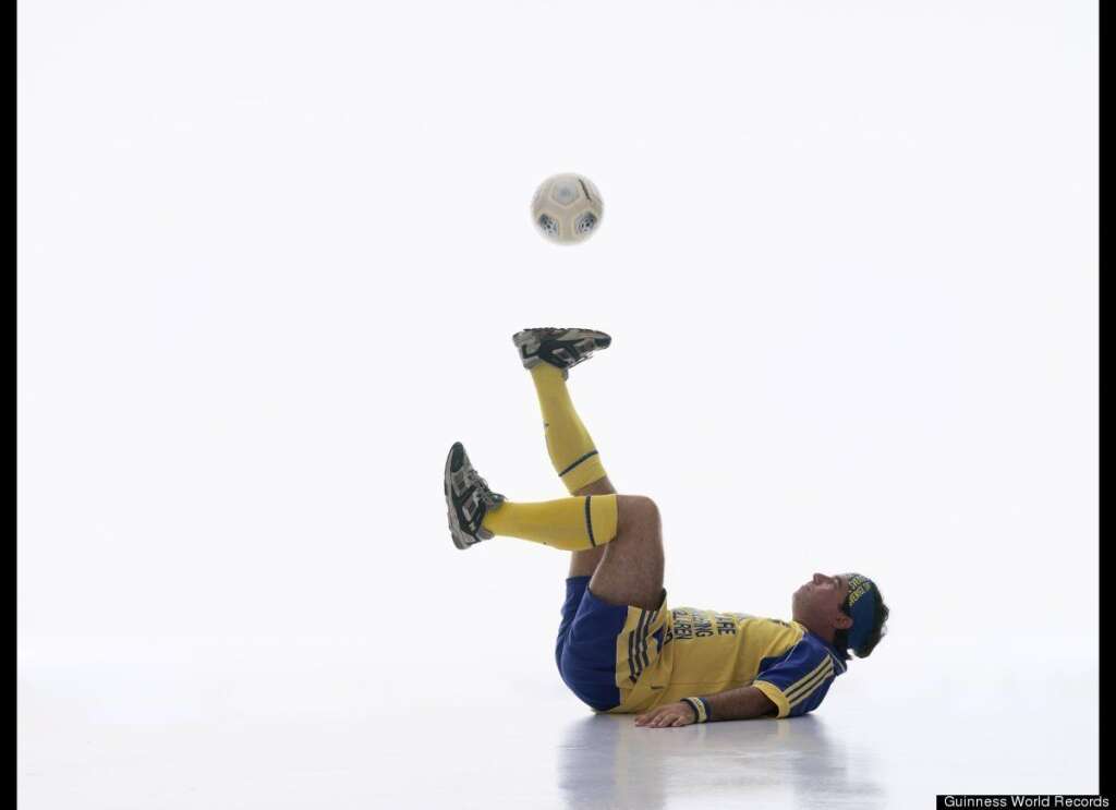 Longest Time Controlling A Football While Lying Down - The record for the longest time controlling a football whilst lying down is 10 min and 4 sec and was achieved by Tomas Lundman (Sweden) at the Nordstan Shopping Mall, in Gothenburg, Sweden on November 24, 2007.