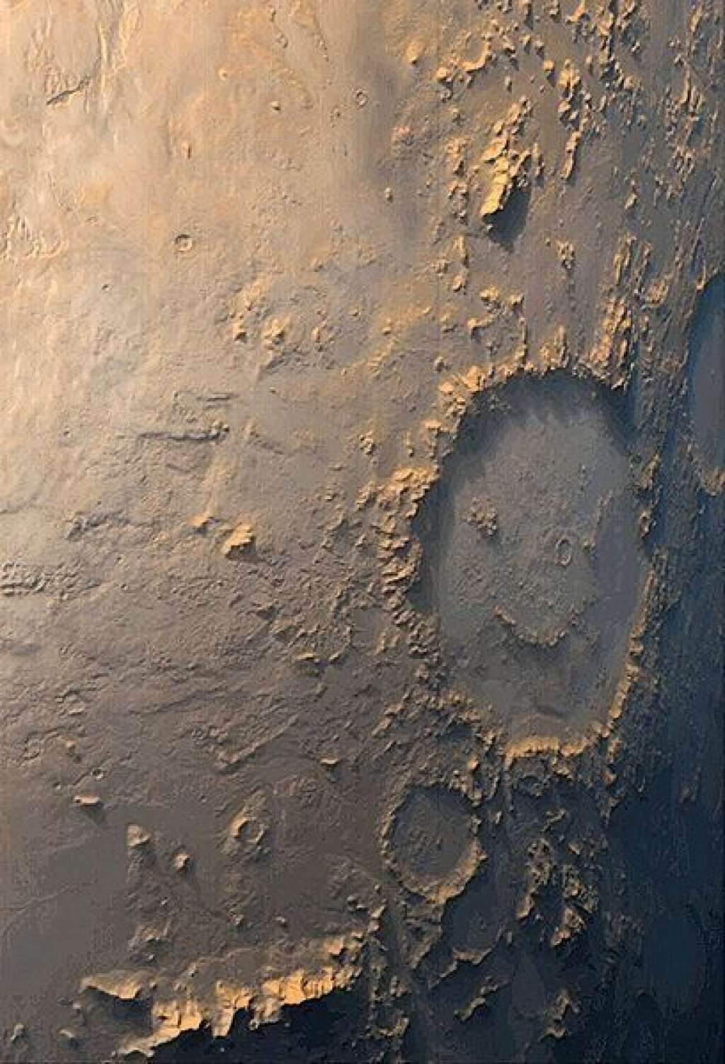 Le sourire de Mars - Le visage souriant sur la droite de la photo correspond au cratère Galle sur Mars (photo prise en 1999).
