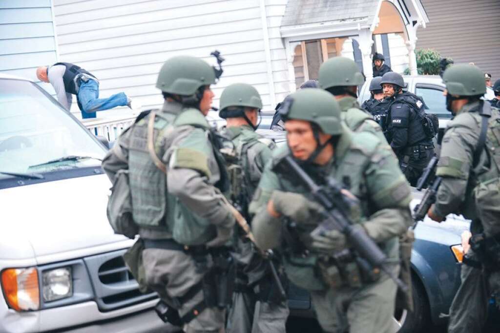 New Boston Bombing Arrest Photos - <a href="http://www.bostonmagazine.com/news/article/2013/08/27/dzhokhar-tsarnaev-manhunt-photos/1/">Dzhokhar Tsarnaev</a>. (Sean Murphy / Massachusetts State Police)