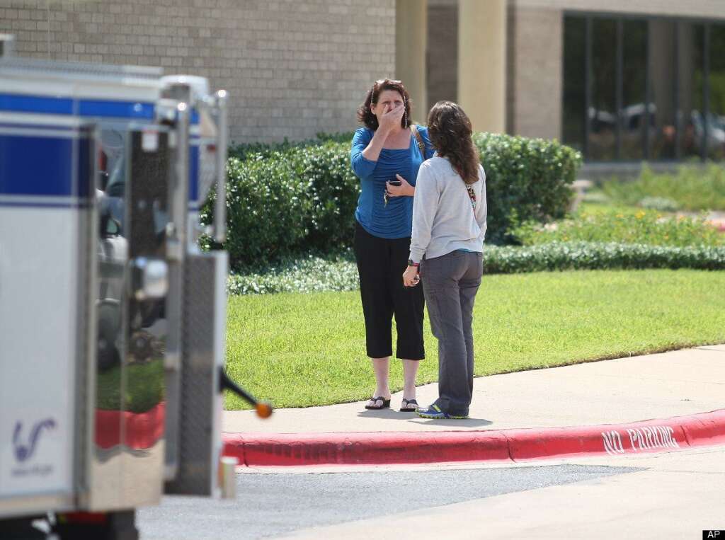 - A woman reacts outside of the College Station Medical Center, Monday, Aug. 13, 2012, in College Station, Texas where five victims were brought, following a shooting near the Texas A&M campus. A gunman and a law enforcement officer were among three people killed Monday in a shooting near a Texas university campus, police said. (AP Photo/Houston Chronicle, Karen Warren)
