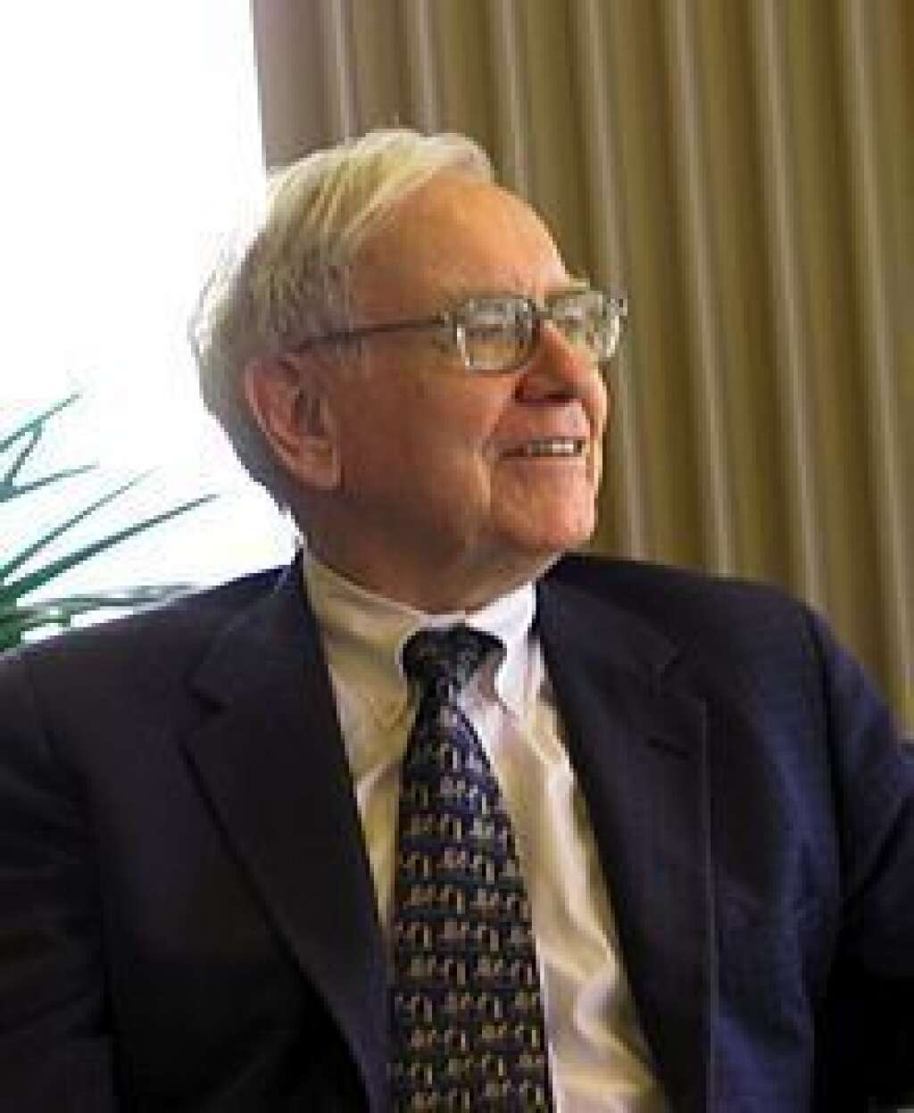 26. Warren Buffett - Homme d'affaires et philantrope, (1930- ) 64 milliards de dollars