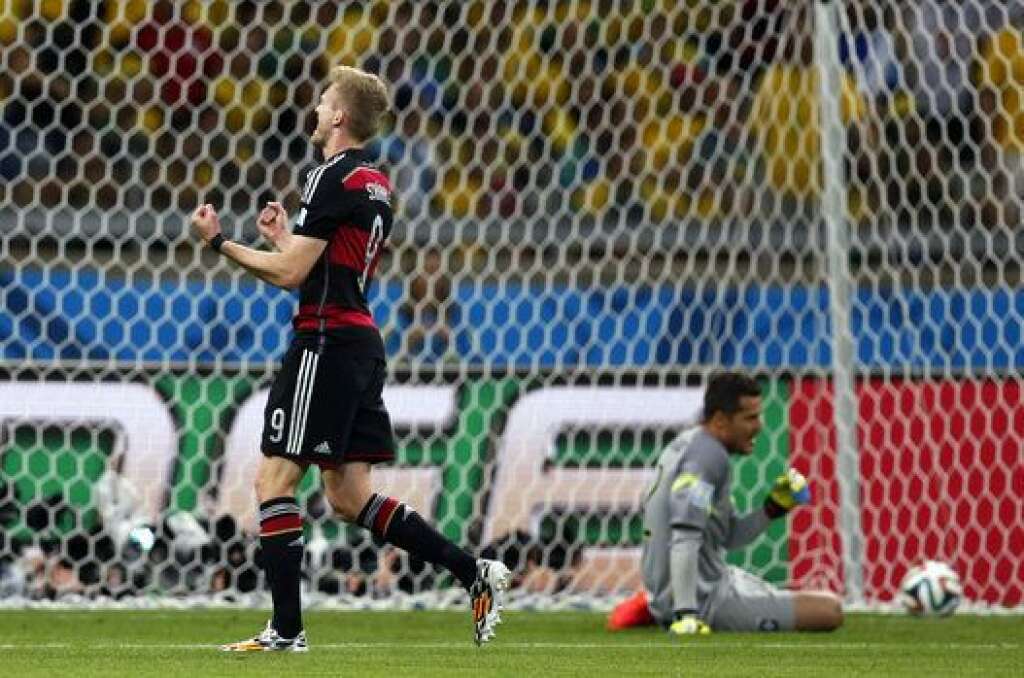 Brazil Soccer WCup Brazil Germany - Germany's Andre Schuerrle celebrates after scoring his side's sixth goal during the World Cup semifinal soccer match between Brazil and Germany at the Mineirao Stadium in Belo Horizonte, Brazil, Tuesday, July 8, 2014. (AP Photo/Frank Augstein)