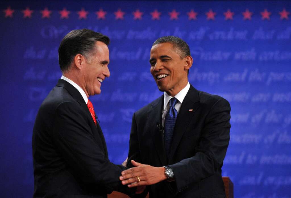 US-VOTE-2012-DEBATE - US President Barack Obama (R) and Republican challenger Mitt Romney shake hands following their first debate at the University of Denver in Denver, Colorado, October 3, 2012. After hundreds of campaign stops, $500 million in mostly negative ads and countless tit-for-tat attacks,  Obama and Romney went head-to-head in their debut debate.    AFP PHOTO /  Nicholas KAMM        (Photo credit should read NICHOLAS KAMM/AFP/GettyImages)
