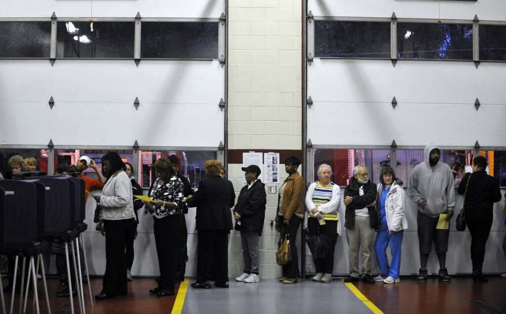 - Voters wait in line to cast their ballots at the Mauldin Fire Station on Election Day, Tuesday, Nov. 6, 2012, in Mauldin, S.C. (AP Photo/Rainier Ehrhardt)
