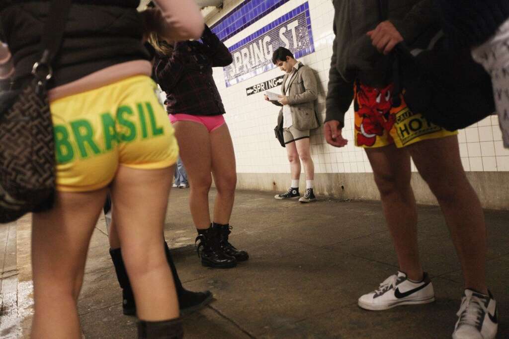 No Pants Subway Ride - Participants wait for their train during the annual No Pants Subway Ride on Jan. 8, 2012 in New York City. The annual event is staged by the group Improv Everywhere which encourages people in dozens of cities worldwide to discard their pants while riding the subway. (Mario Tama, Getty Images)