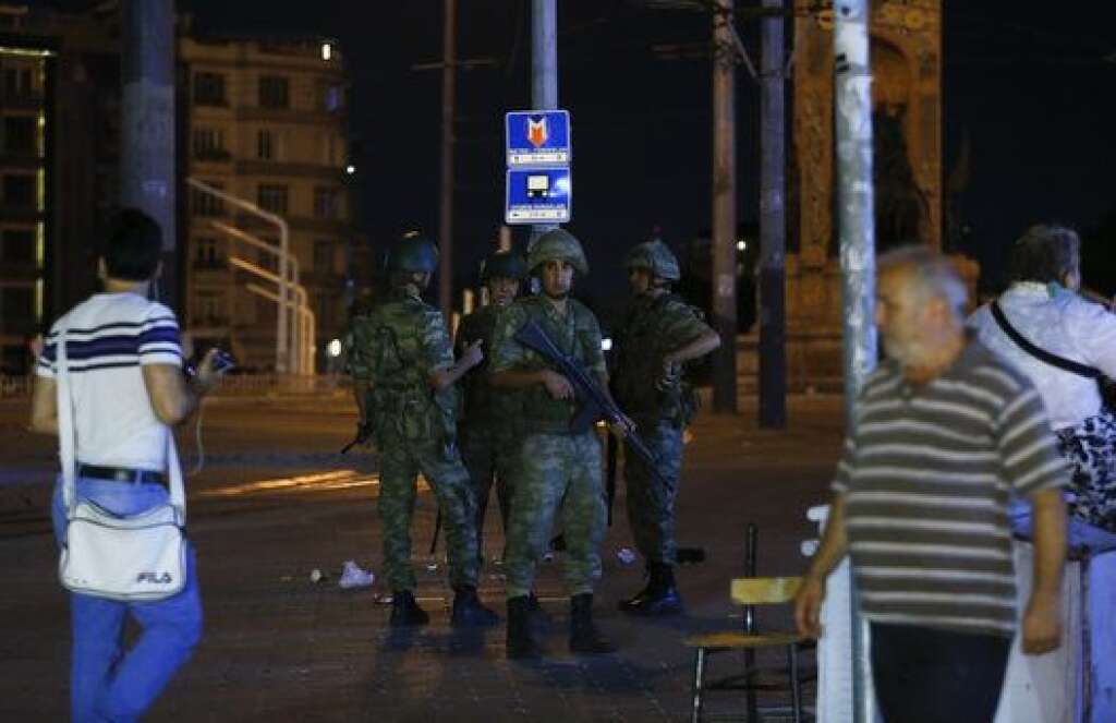 Turkish military stand guard near the the Taksim Square in Istanbul, Turkey, July 15, 2016.   REUTERS/Murad Sezer