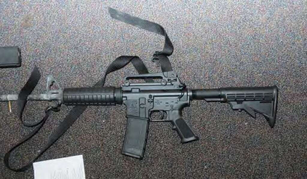 Connecticut State Police Release Sandy Hook Report - NEWTOWN, CT - UNSPECIFED DATE:  In this handout crime scene evidence photo provided by the Connecticut State Police, shows a Bushmaster rifle in Room 10 at Sandy Hook Elementary School following the December 14, 2012 shooting rampage, taken on an unspecified date in Newtown, Connecticut . A report was released November 25, 2013 by Connecticut State Attorney Stephen Sedensky III summarizing the Newtown school shooting that left 20 children and six women dead inside Sandy Hook Elementary School. According to the report, a motive behind the shooting by gunman Adam Lanza is still unknown.  (Photo by Connecticut State Police via Getty Images)