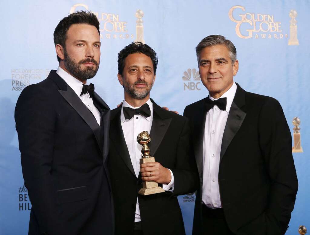 Ben Affleck et ses producteurs - Récompensé ainsi que ses producteurs (George Clooney à droite) pour Argo, Affleck profite des Golden Globes 2013 pour asseoir sa réputation de réalisateur.