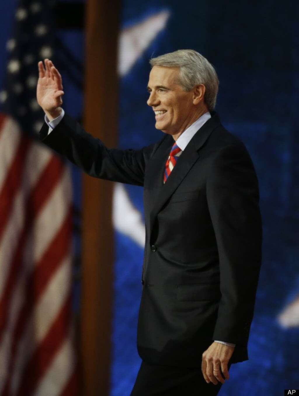 Ohio Senator Rob Portman waves to delegates before his speech during the Republican National Convention in Tampa, Fla., on Wednesday, Aug. 29, 2012. (AP Photo/Lynne Sladky)