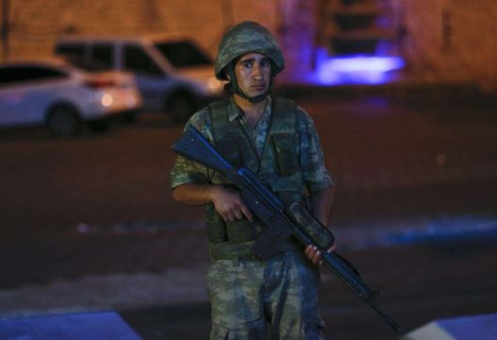 A Turkish military stands guard near the Taksim Square in Istanbul, Turkey, July 15, 2016.   REUTERS/Murad Sezer