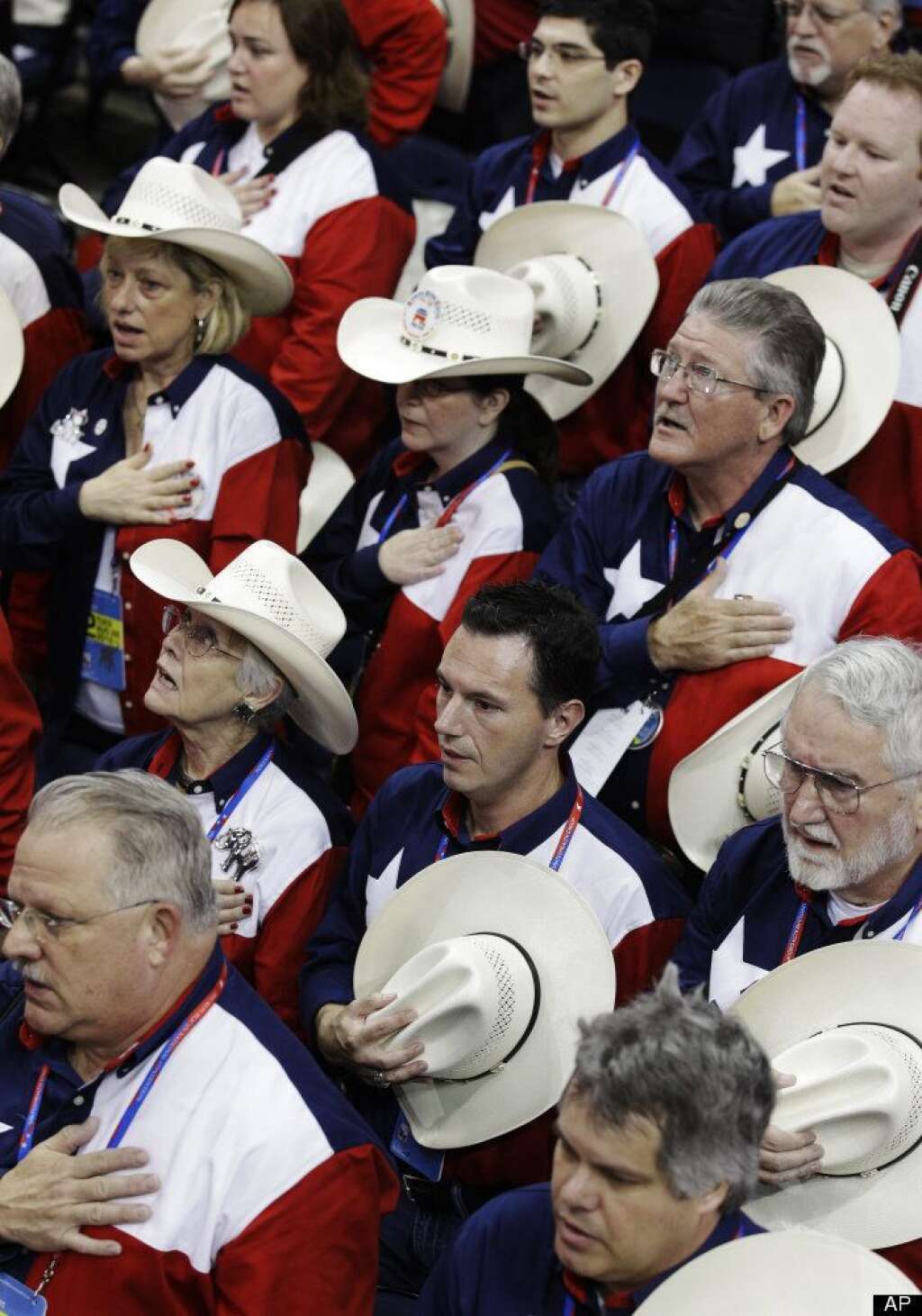 Texas delegates recite the Pledge of Allegiance during the Republican National Convention in Tampa, Fla., on Tuesday, Aug. 28, 2012. (AP Photo/Charlie Neibergall)
