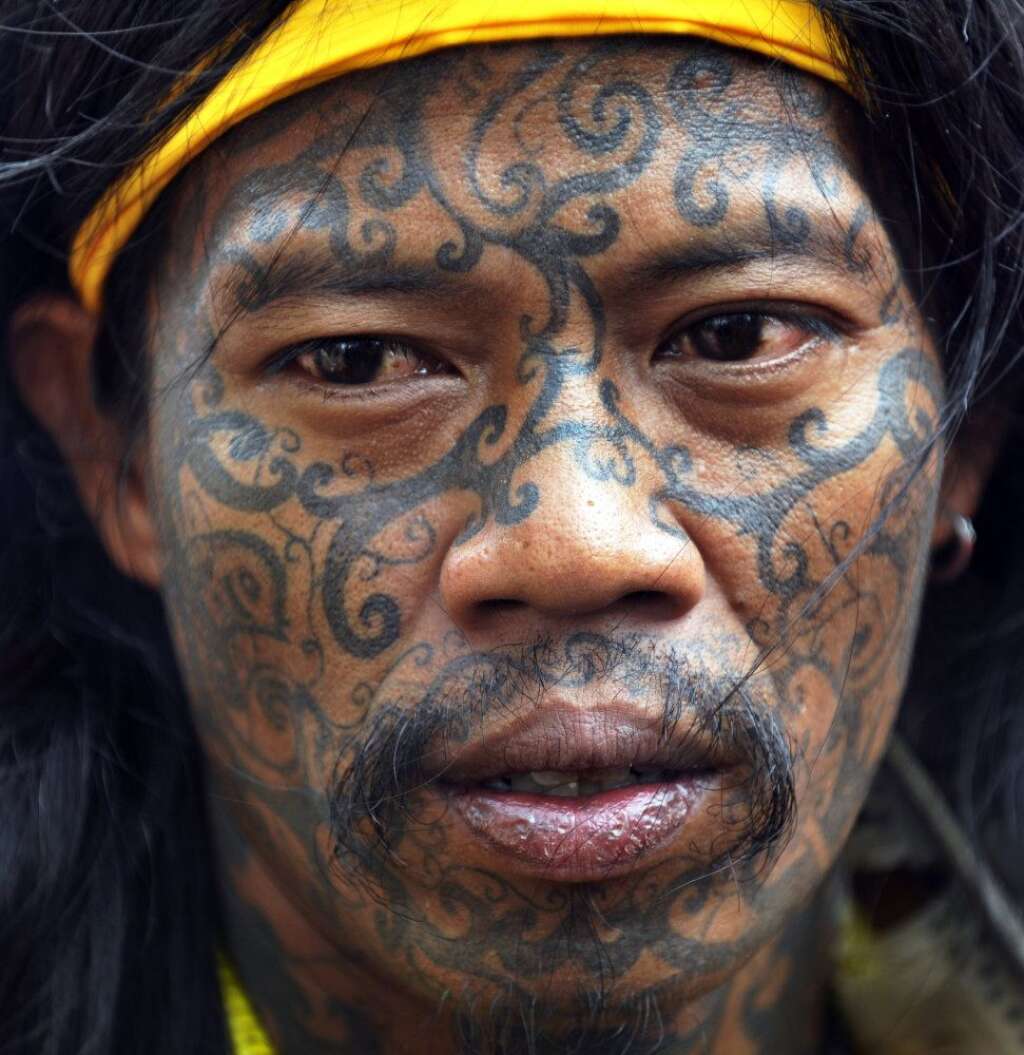 Les tatouages les plus fous - Un membre de la tribu Dayak de l'île de Borneo, janvier 2011.
