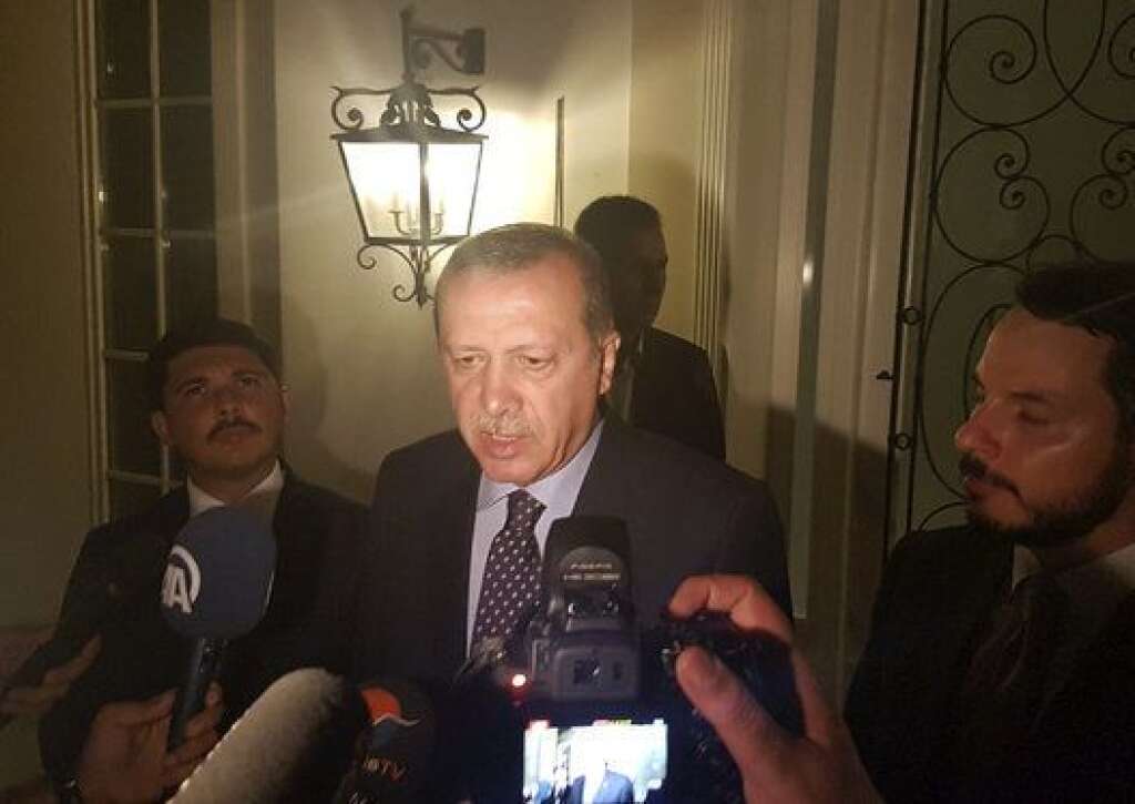 Turkish President Tayyip Erdogan speaks to media in the resort town of Marmaris, Turkey, July 15, 2016.    REUTERS/Kenan Gurbuz  TPX IMAGES OF THE DAY