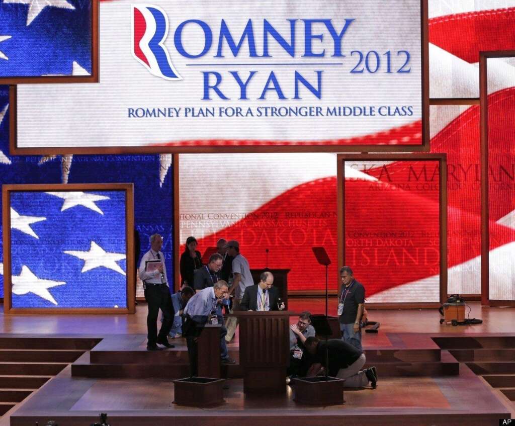 Stagehands make final adjustments to the expanded stage where Republican presidential nominee Mitt Romney will accept his party's nomination later tonight a the Republican National Convention in Tampa, Fla., on Thursday, Aug. 30, 2012. (AP Photo/J. Scott Applewhite)