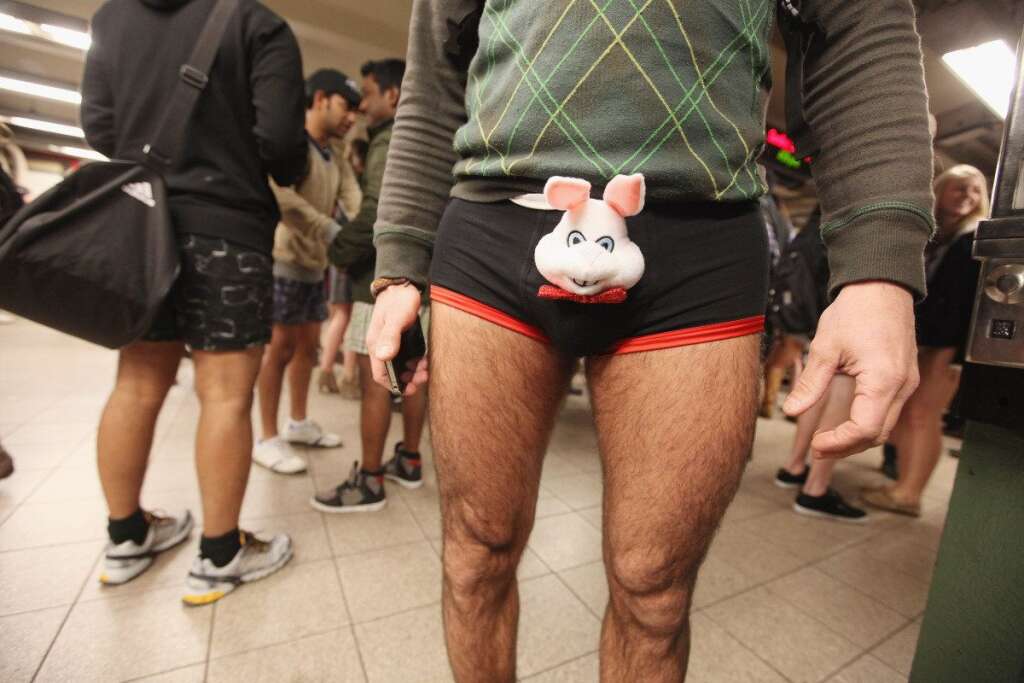 No Pants Subway Ride - Participants gather in the Union Square subway station during the annual No Pants Subway Ride on Jan. 8, 2012 in New York City.  The annual event is staged by the group Improv Everywhere which encourages people in dozens of cities worldwide to discard their pants while riding the subway. (Mario Tama, Getty Images)