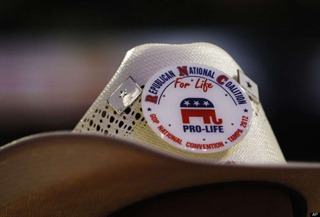 Alex Casetta, a delegate from Denver, Colo., wears a Pro-Life button on his hat following the opening session of the Republican National Convention in Tampa, Fla., on Monday, Aug. 27, 2012. (AP Photo/Lynne Sladky)