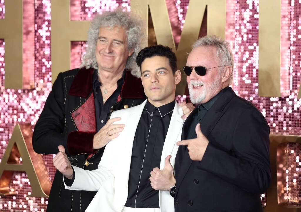 Rami Malek (Freddie Mercury dans le film) avec Brian May et Roger Taylor, deux membres de Queen