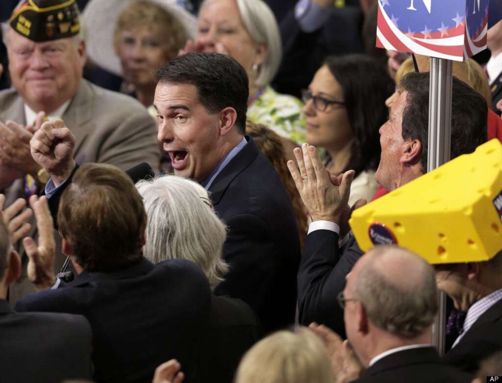 Scott Walker - Wisconsin Gov. Scott Walker reacts as he casts his states votes for former Massachusetts Gov. Mitt Romney during the Republican National Convention in Tampa, Fla., on Tuesday, Aug. 28, 2012. (AP Photo/J. Scott Applewhite)