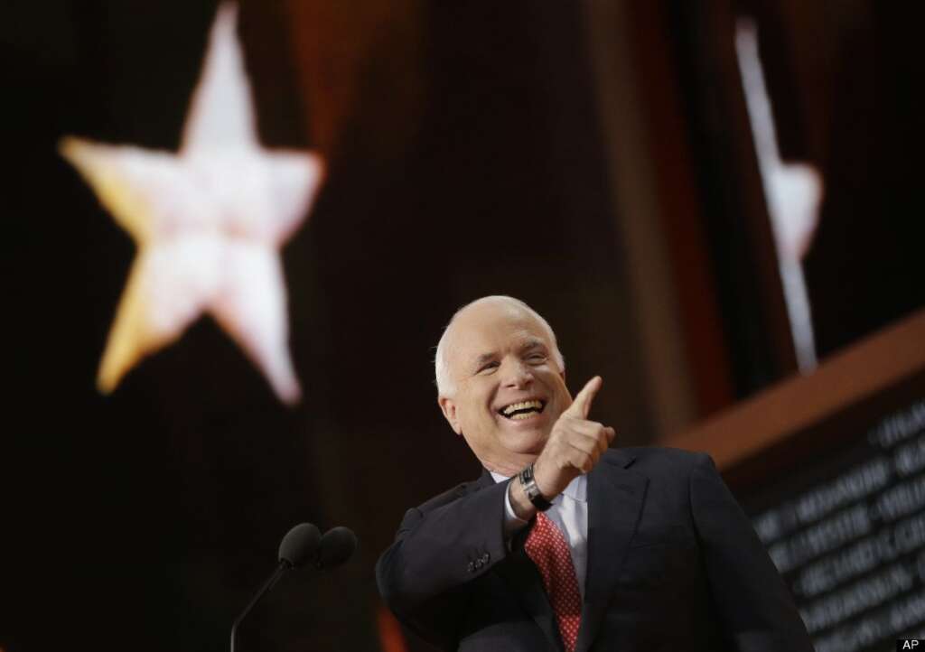 John McCain - Arizona Senator John McCain gestures as he walks up to the podium during the Republican National Convention in Tampa, Fla., on Wednesday, Aug. 29, 2012. (AP Photo/Charles Dharapak)