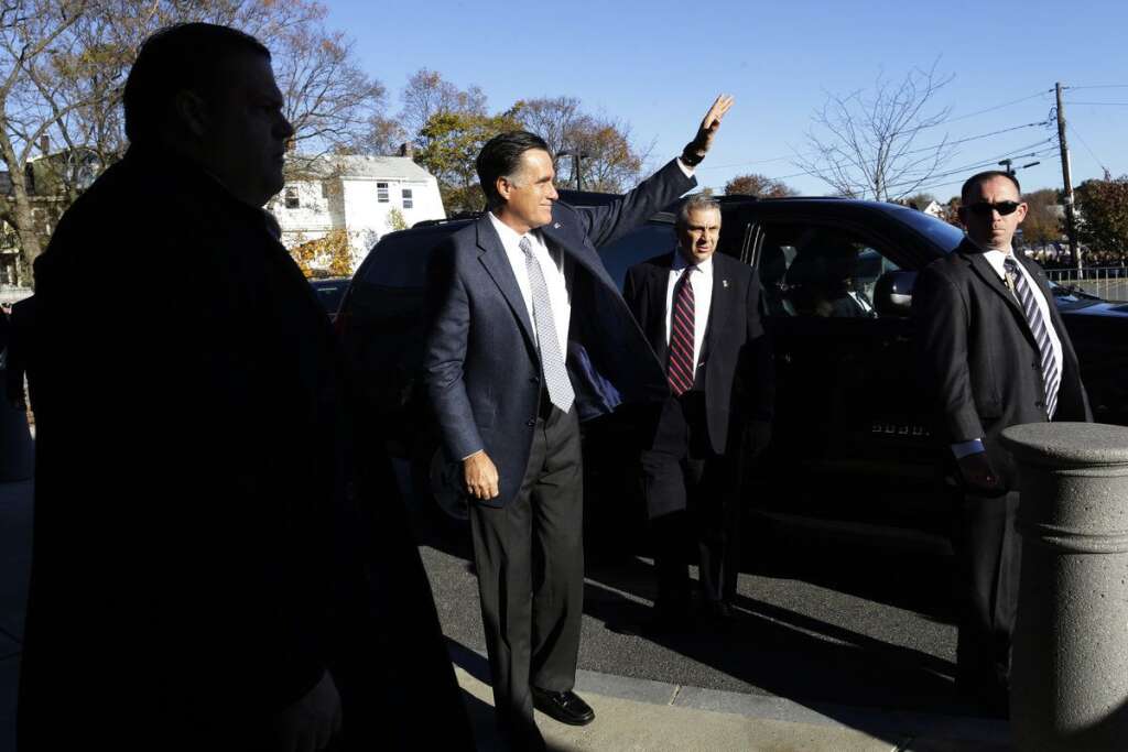 Mitt Romney - Republican presidential candidate, former Massachusetts Gov. Mitt Romney waves as he arrives at a polling station to vote in Belmont, Mass., Tuesday, Nov. 6, 2012. (AP Photo/Charles Dharapak)