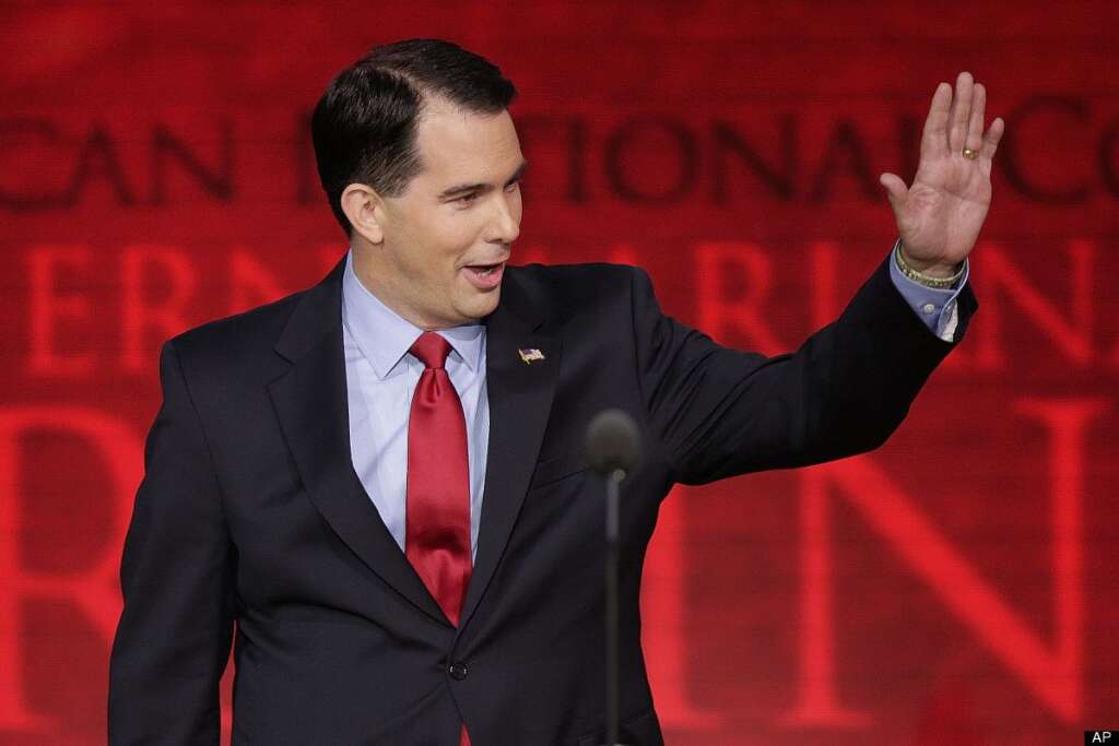 Scott Walker - Wisconsin Gov. Scott Walker waves to delegates during the Republican National Convention in Tampa, Fla., on Tuesday, Aug. 28, 2012. (AP Photo/J. Scott Applewhite)