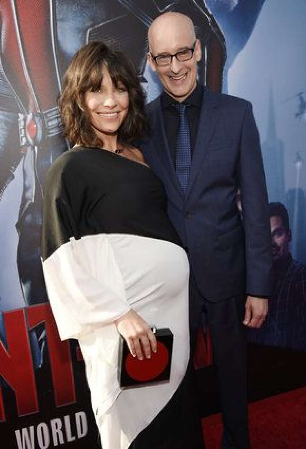 LA Premiere of "Ant-Man" - Red Carpet - Evangeline Lilly, left, a cast member in "Ant-Man," poses with director Peyton Reed at the premiere of the film at The Dolby Theatre on Monday, June 29, 2015, in Los Angeles. (Photo by Chris Pizzello/Invision/AP)