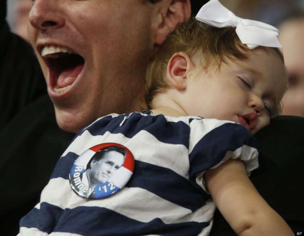 Kyle Welch, Lillian Welch - Kyle Welch from Cambridge, Mass., cheer as his 1-year-old daughter Lillian sleeps during the Republican National Convention in Tampa, Fla., on Tuesday, Aug. 28, 2012. (AP Photo/Jae C. Hong)