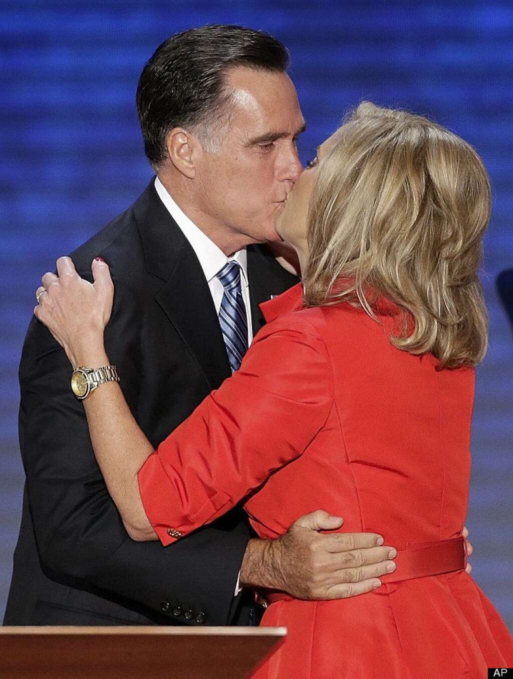 Mitt Romney, Ann Romney - Ann Romney is kissed by her husband Republican presidential nominee Mitt Romney during the Republican National Convention in Tampa, Fla. on Tuesday, Aug. 28, 2012. (AP Photo/J. Scott Applwhite)