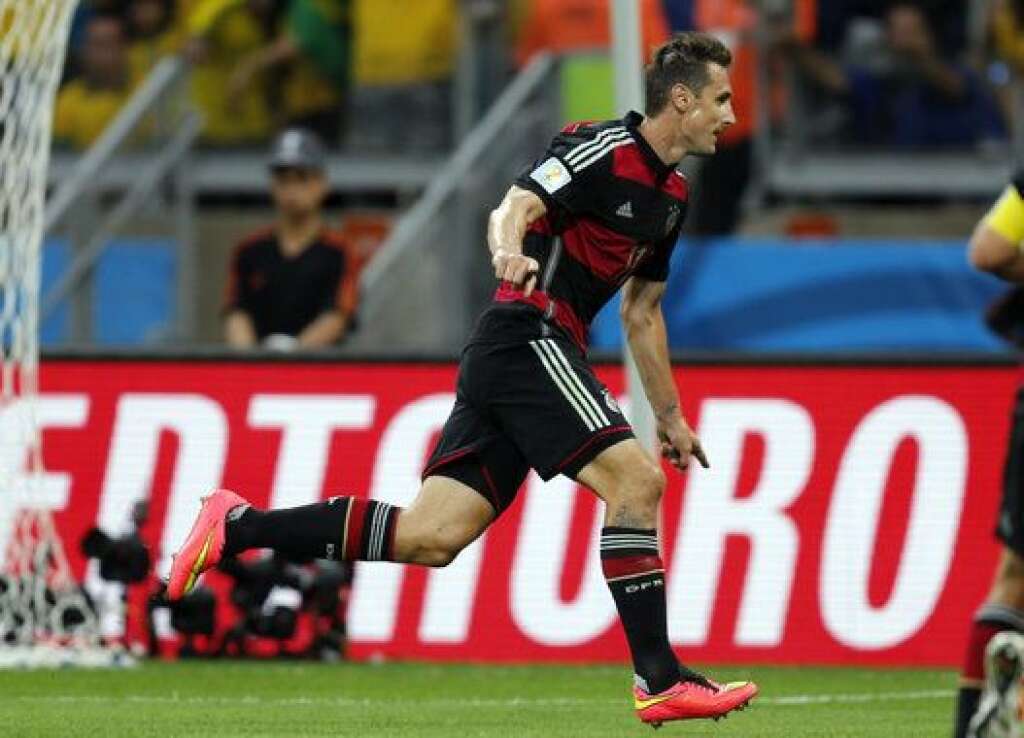 Brazil Soccer WCup Brazil Germany - Germany's Miroslav Klose celebrates after scoring his side's second goal during the World Cup semifinal soccer match between Brazil and Germany at the Mineirao Stadium in Belo Horizonte, Brazil, Tuesday, July 8, 2014. (AP Photo/Frank Augstein)