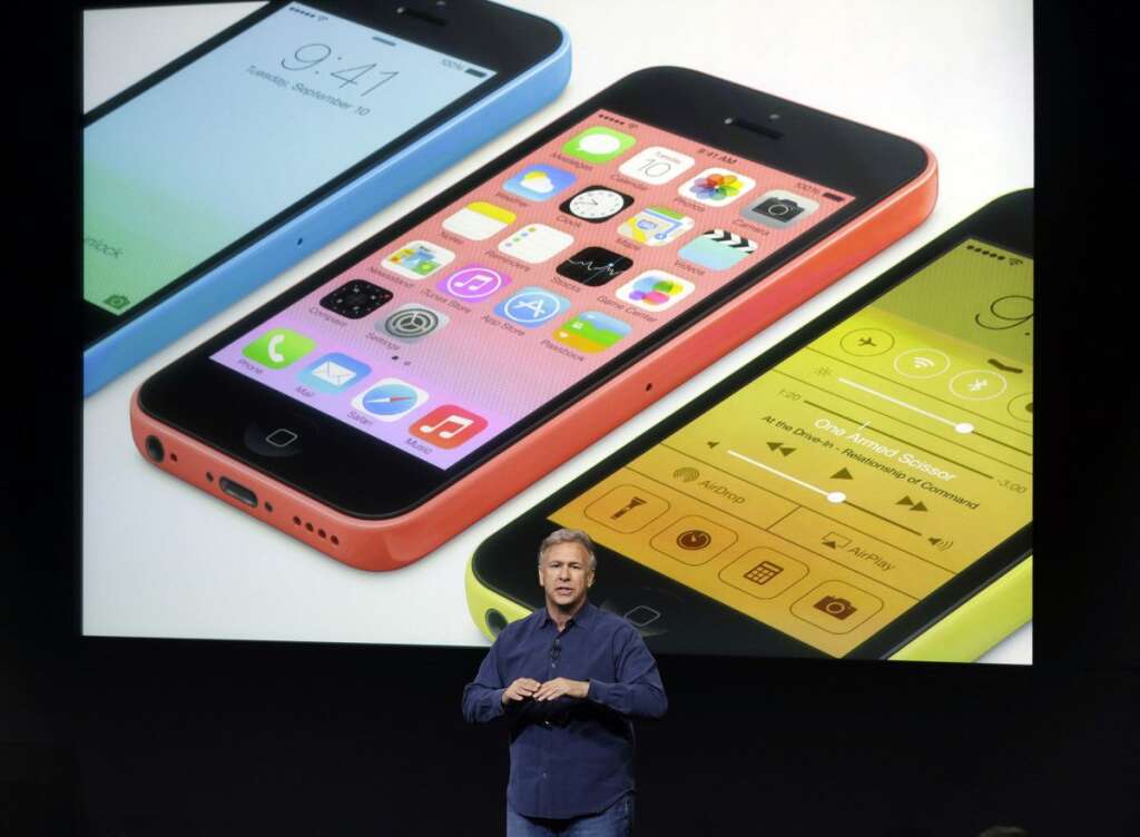 Keynote Apple - Phil Schiller, Apple's senior vice president of worldwide product marketing, speaks on stage during the introduction of the new iPhone 5c in Cupertino, Calif., Tuesday, Sept. 10, 2013. (AP Photo/Marcio Jose Sanchez)